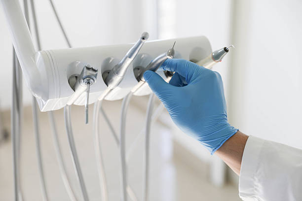 Professional Root Canal Treatment technician working in Perquimans County County, NC